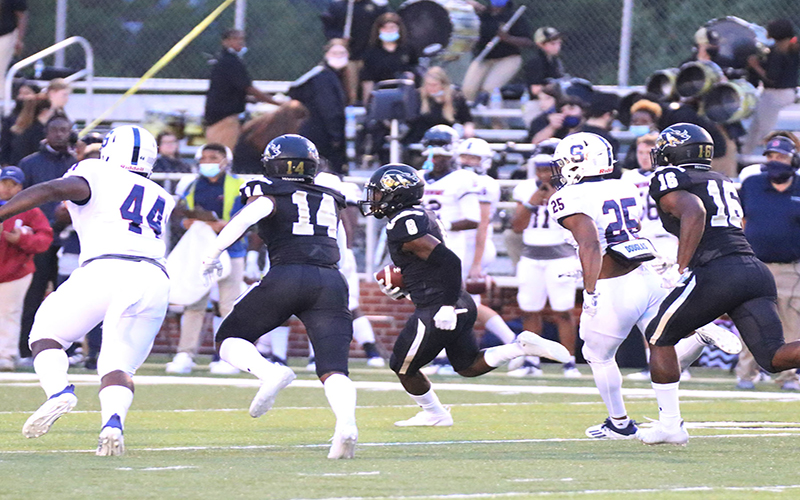 East Central&rsquo;s Desmond Williams (No. 8) returns the game&rsquo;s opening kickoff 95 yards to give the Warriors an early 7-0 over Southwest. (EC Photo)