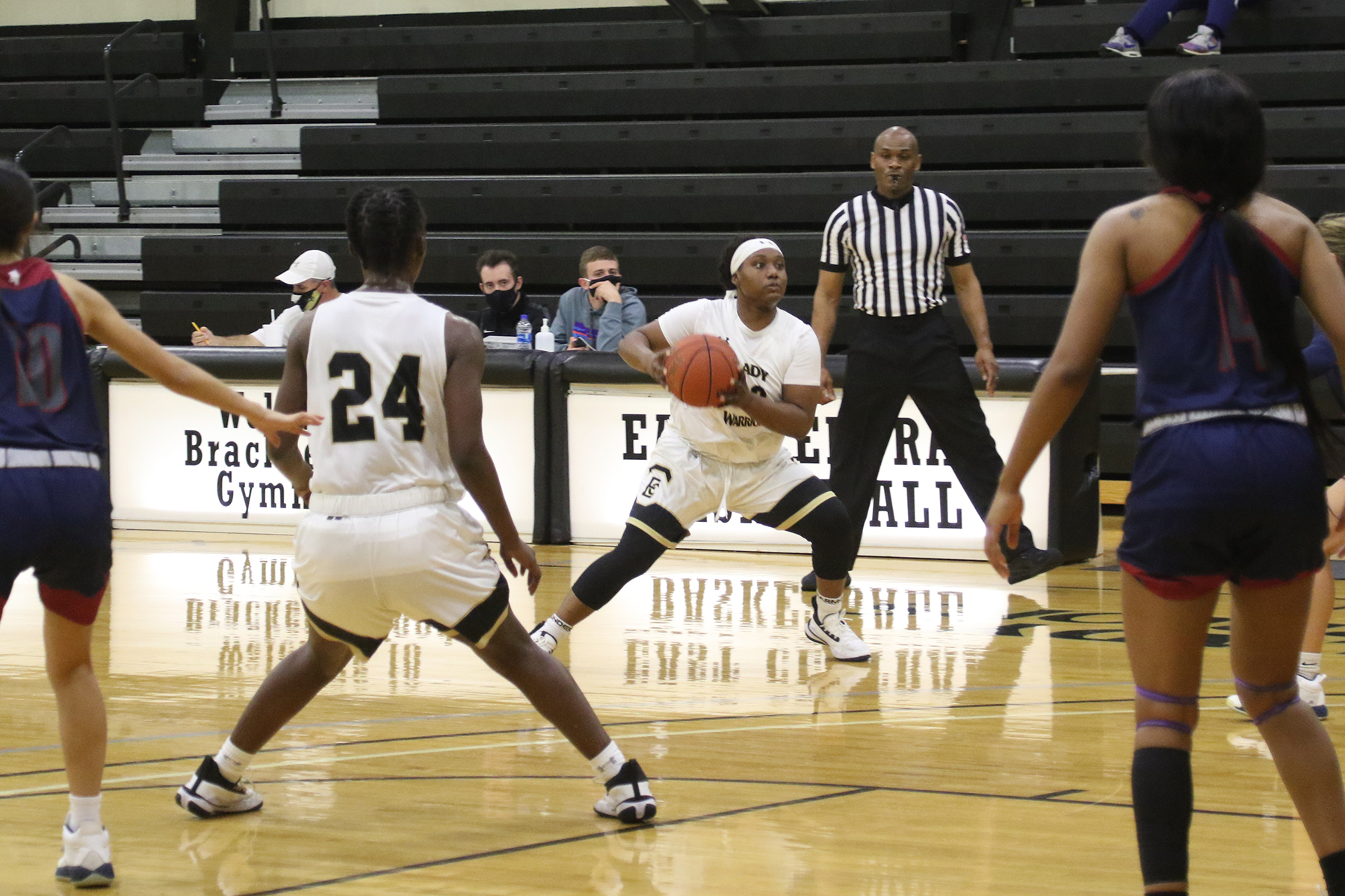 Late scores keep Lady Warriors at bay